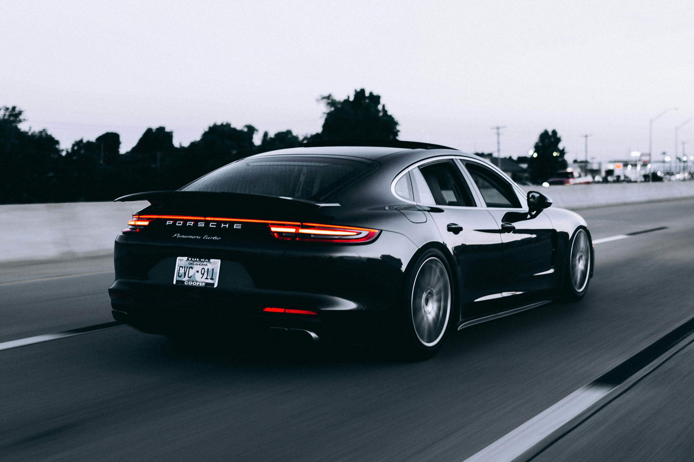 Black Porsche Panamera photographed on the road